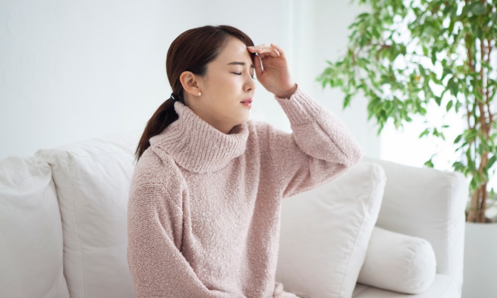 頭痛の女